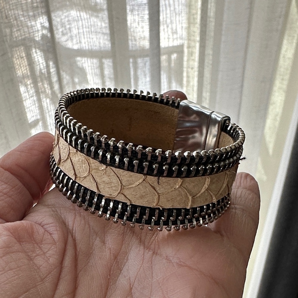Black and silver zipper detail bracelet with tan snake-like band